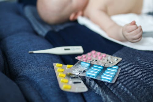 Free Thermometer and Pills Stock Photo