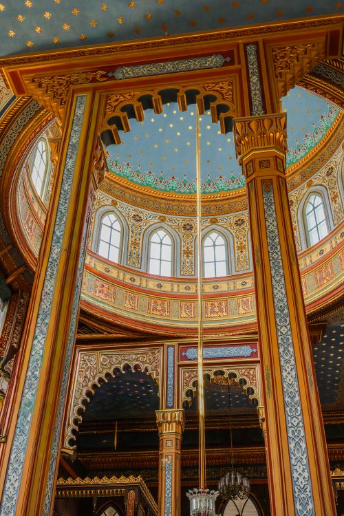 Free Stunning architectural detail of a decorative dome ceiling with intricate patterns and vivid colors. Stock Photo