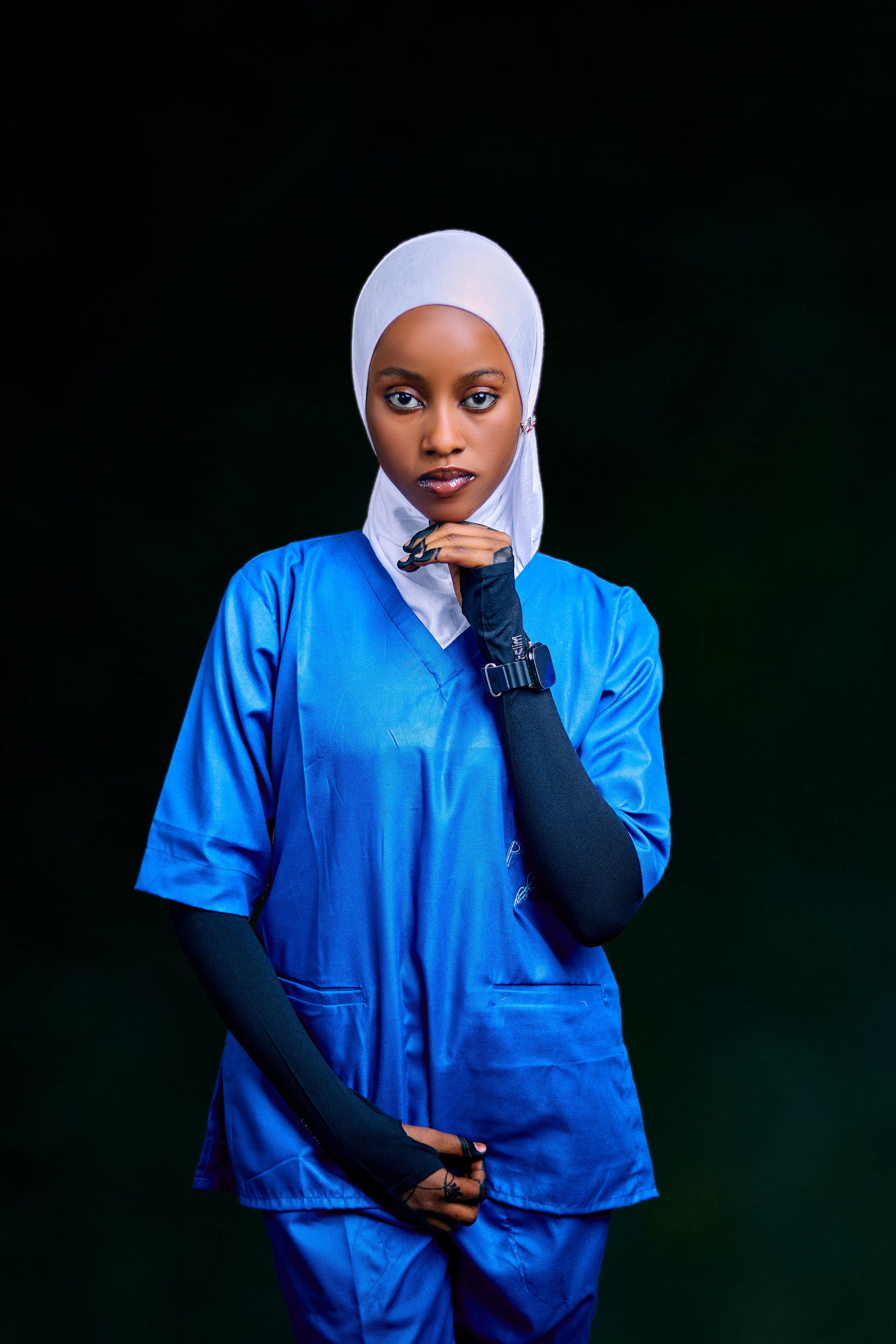 Female medical professional wearing black scrubs