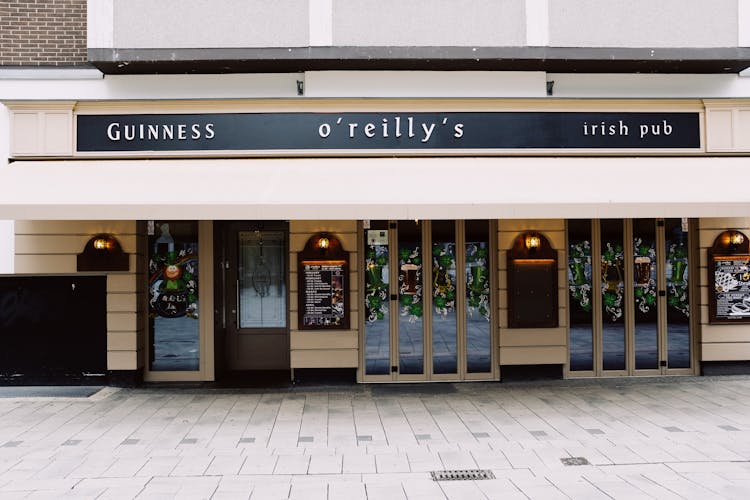 Pub Building With Entrance And Menu In City Street