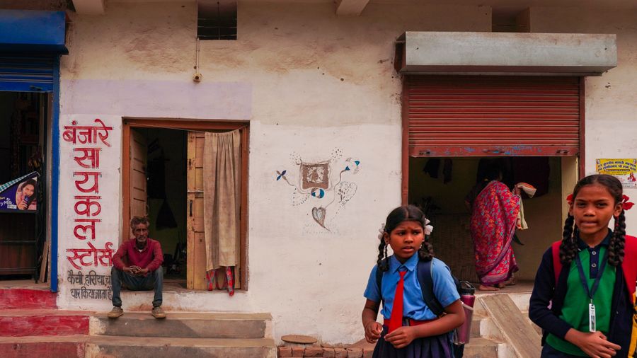 Students of the academy on a community heritage walk during a service project