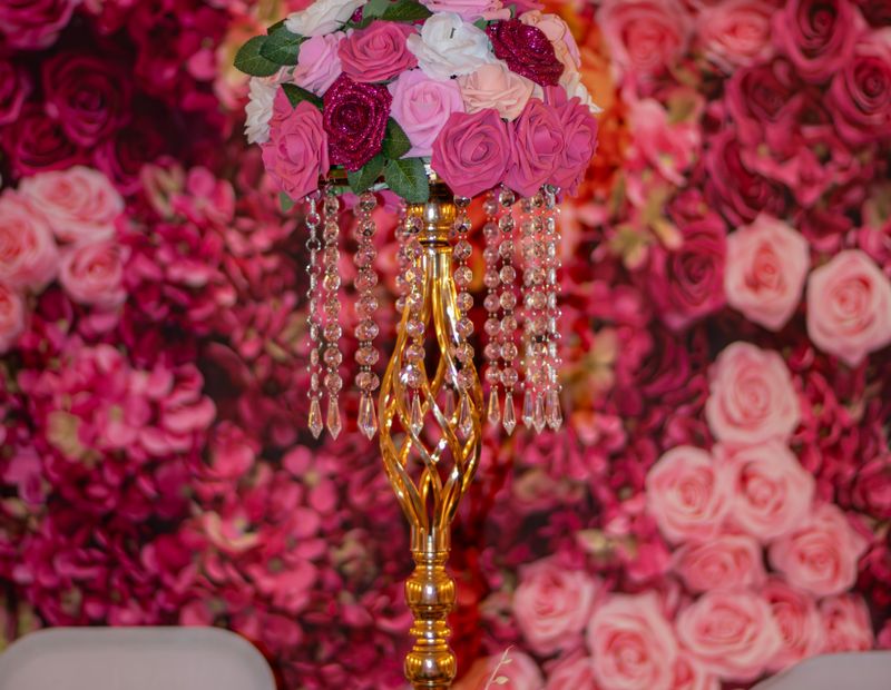 Floral centrepiece with roses and crystal accents