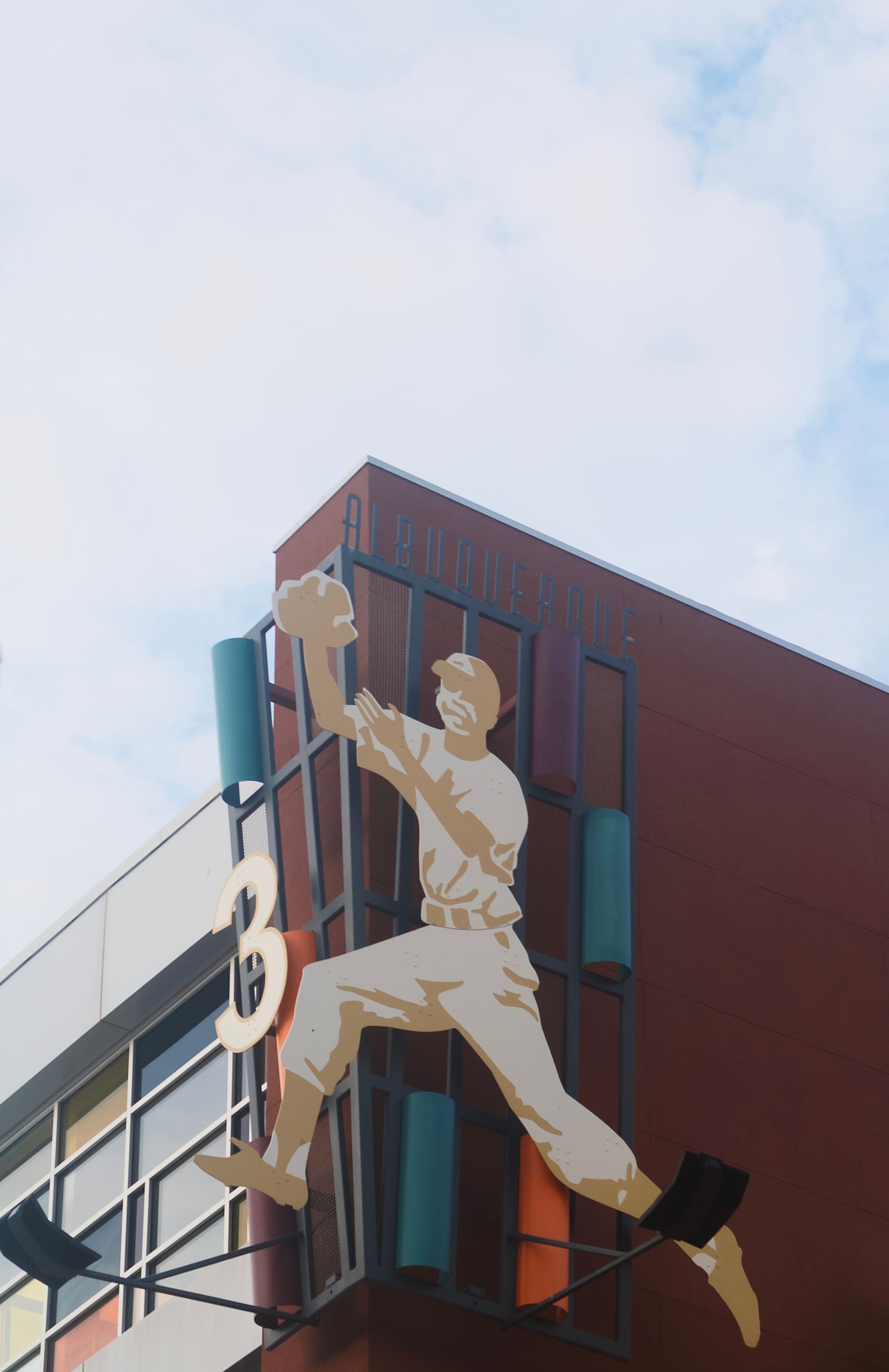 Sculpture of a baseball player at a prominent sports venue in Albuquerque, New Mexico.