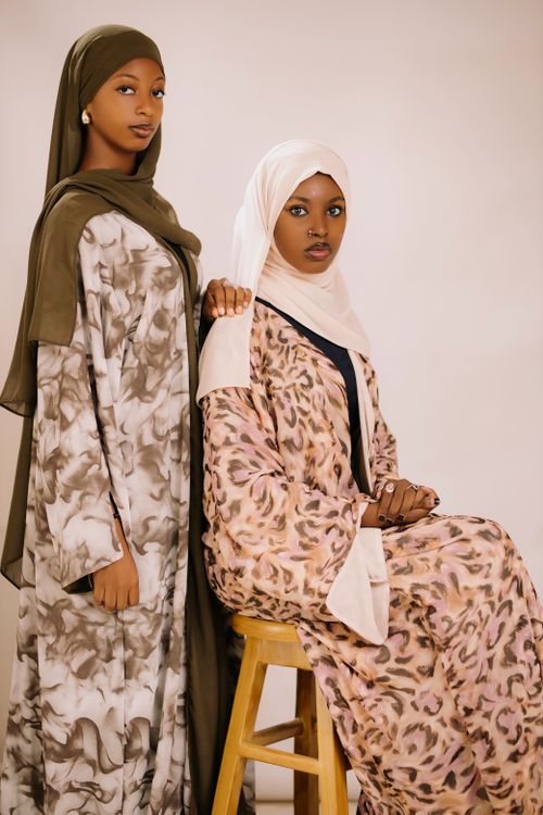 Free Two women in stylish abayas, showcasing modest fashion in Nigeria. Stock Photo