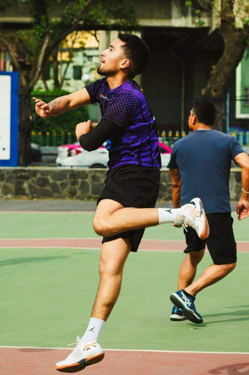 Free Exciting outdoor volleyball match captured in Mexico City, showcasing vibrant athleticism and teamwork. Stock Photo