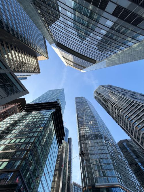 Free Dramatic upward view of skyscrapers in Frankfurt's bustling financial district. Stock Photo