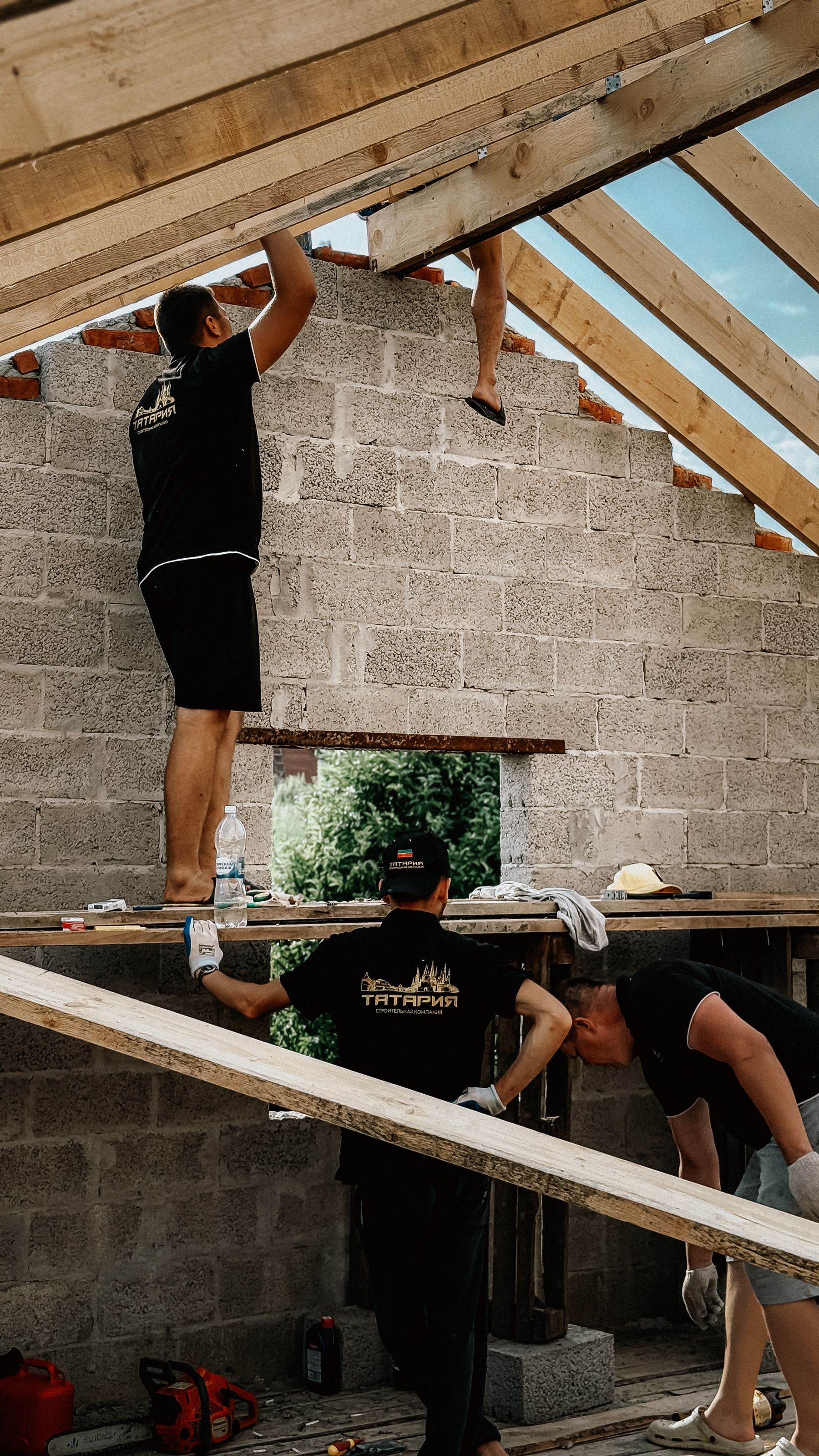 Residential roof framing over masonry walls