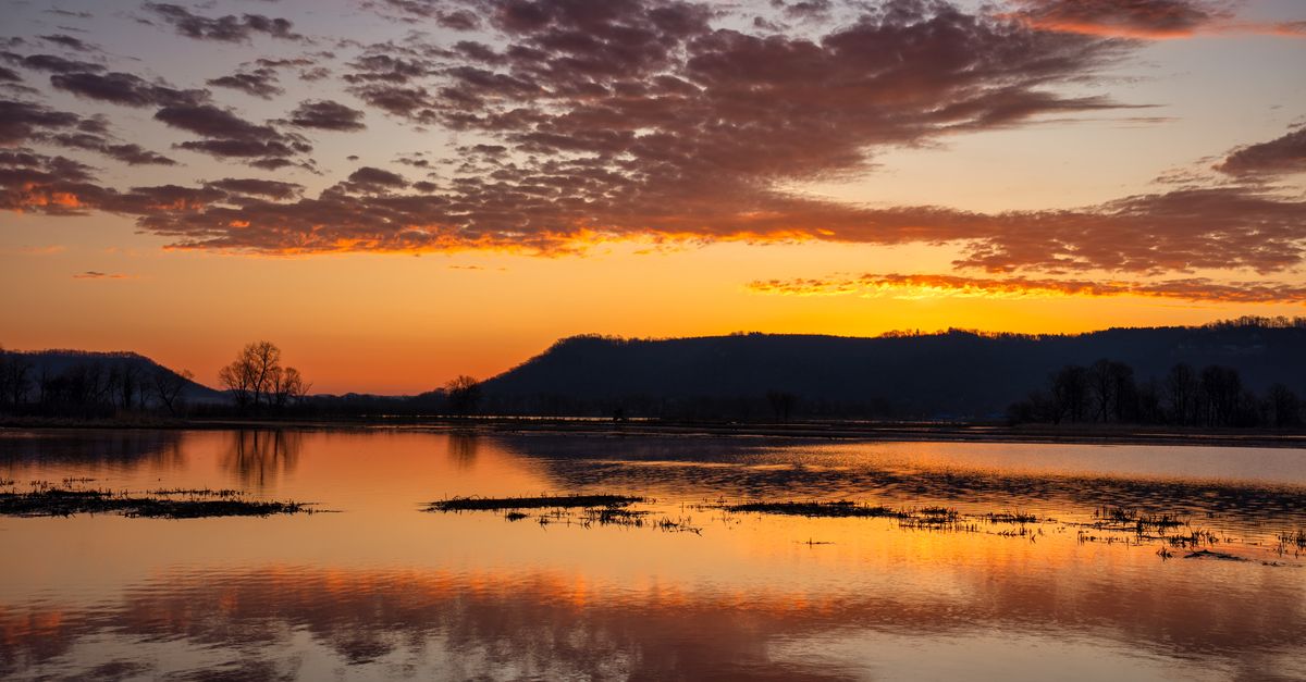 Beautiful sunset reflected in the tranquil wetlands of Wabasha, Minnesota.