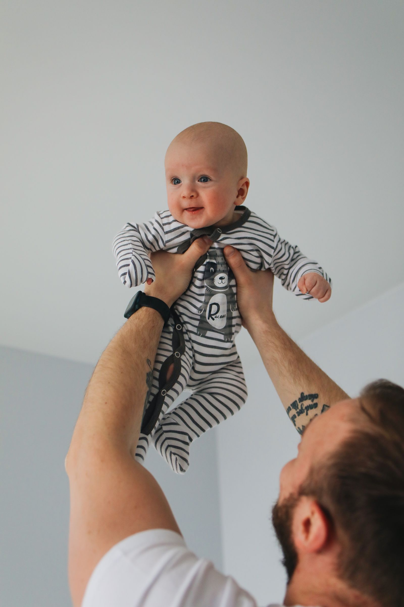 Parent holding a newborn baby