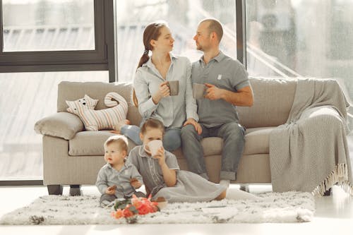 Free Happy family with kids resting at home Stock Photo