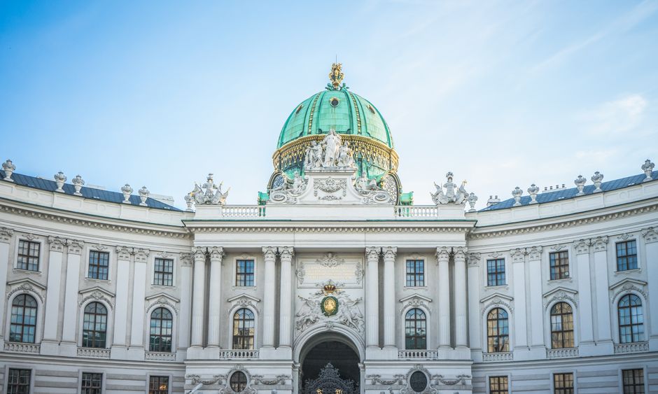 Front view of the majestic Hofburg Palace exterior in Vienna, Austria showcasing its grand architecture.