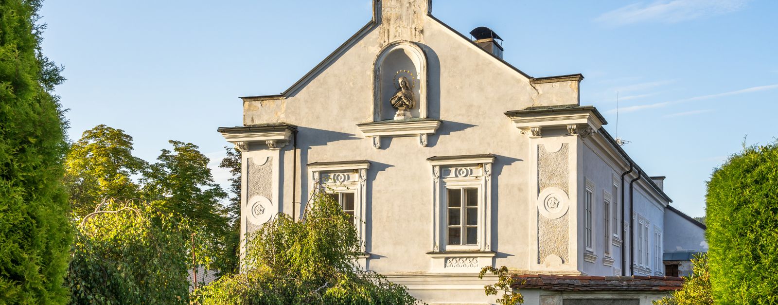 Beautiful Baroque architecture of a historic building in Vyšší Brod, Czechia, on a sunny day.