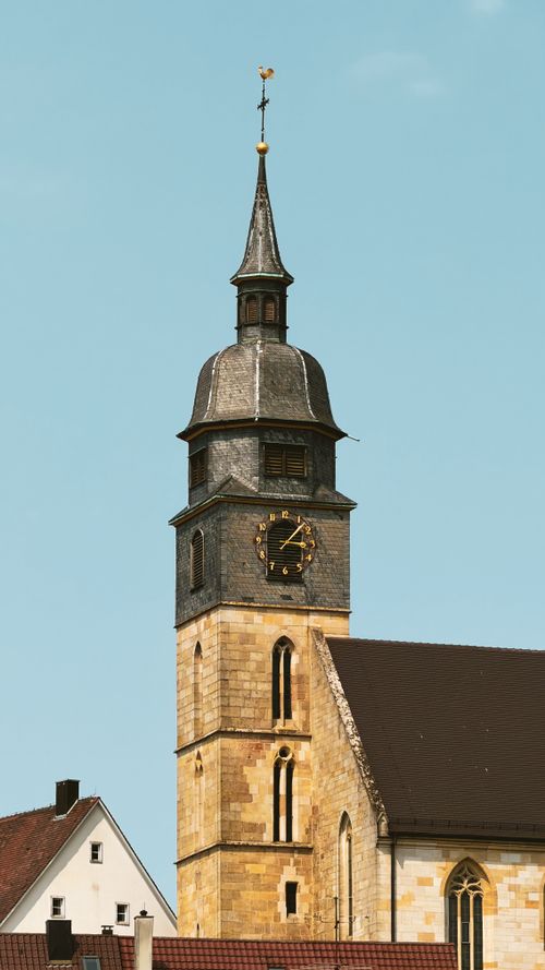 Free Charming view of a historic church tower against a clear blue sky in Böblingen, Germany. Stock Photo