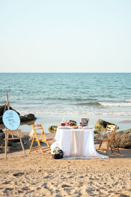 Free A romantic beachside proposal setup in Şile, İstanbul with a charming display for a memorable "Will you marry me?" moment. Stock Photo