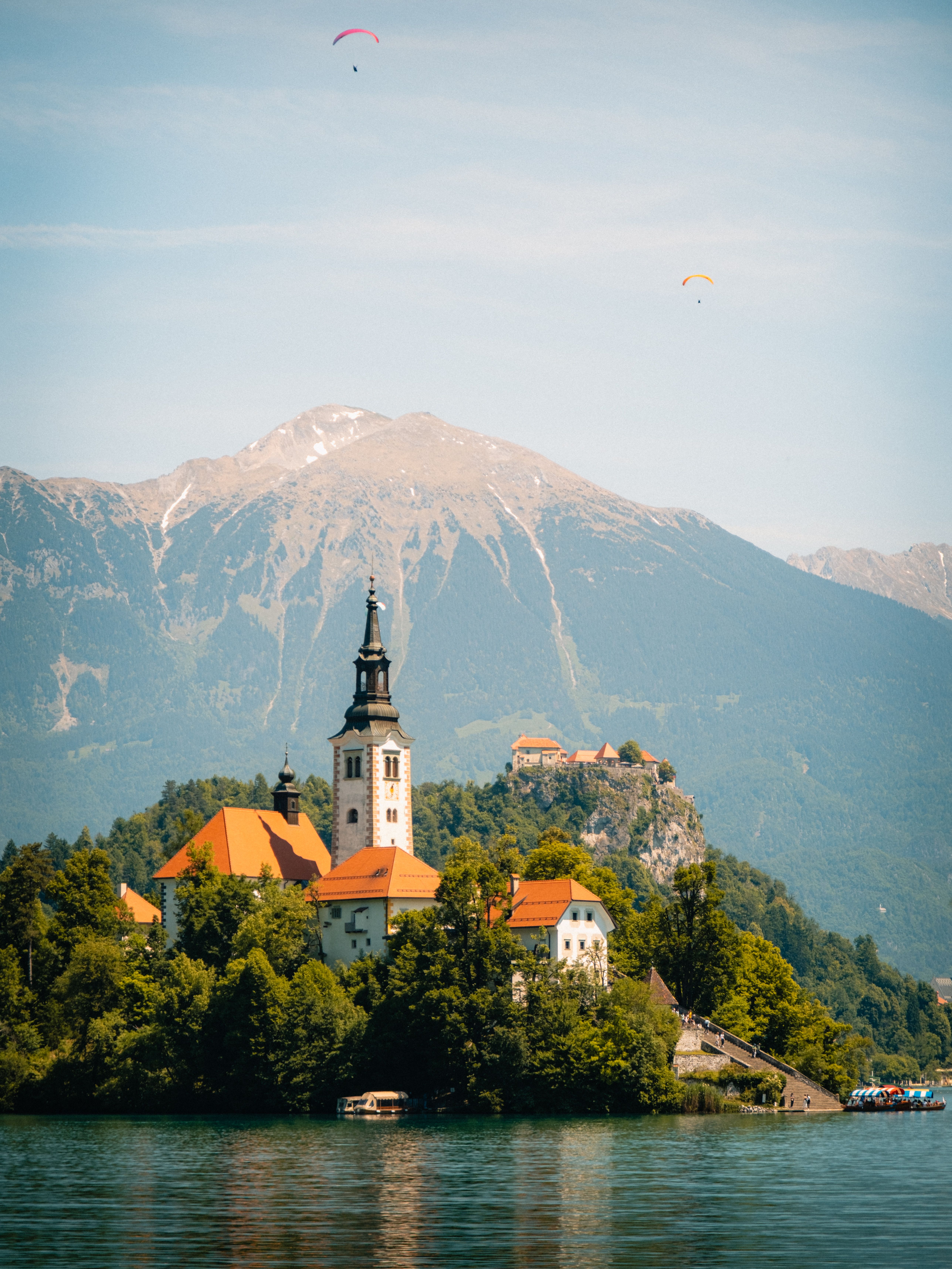 Stunning landscape of Lake Bled with church on island and mountain backdrop, Slovenia.