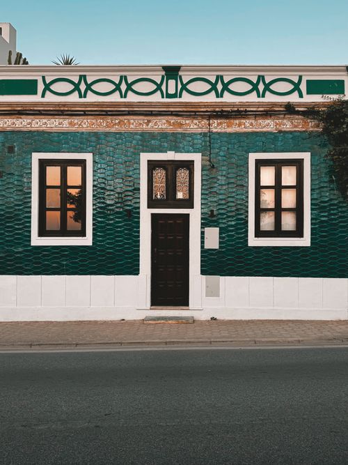 Free A beautifully tiled exterior of a traditional house in Ferragudo, Portugal. Stock Photo