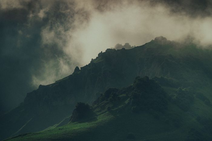 Misty mountain landscape in Chechnya with dramatic clouds and lush greenery., by Zaur Takhgiriev on Pexels
