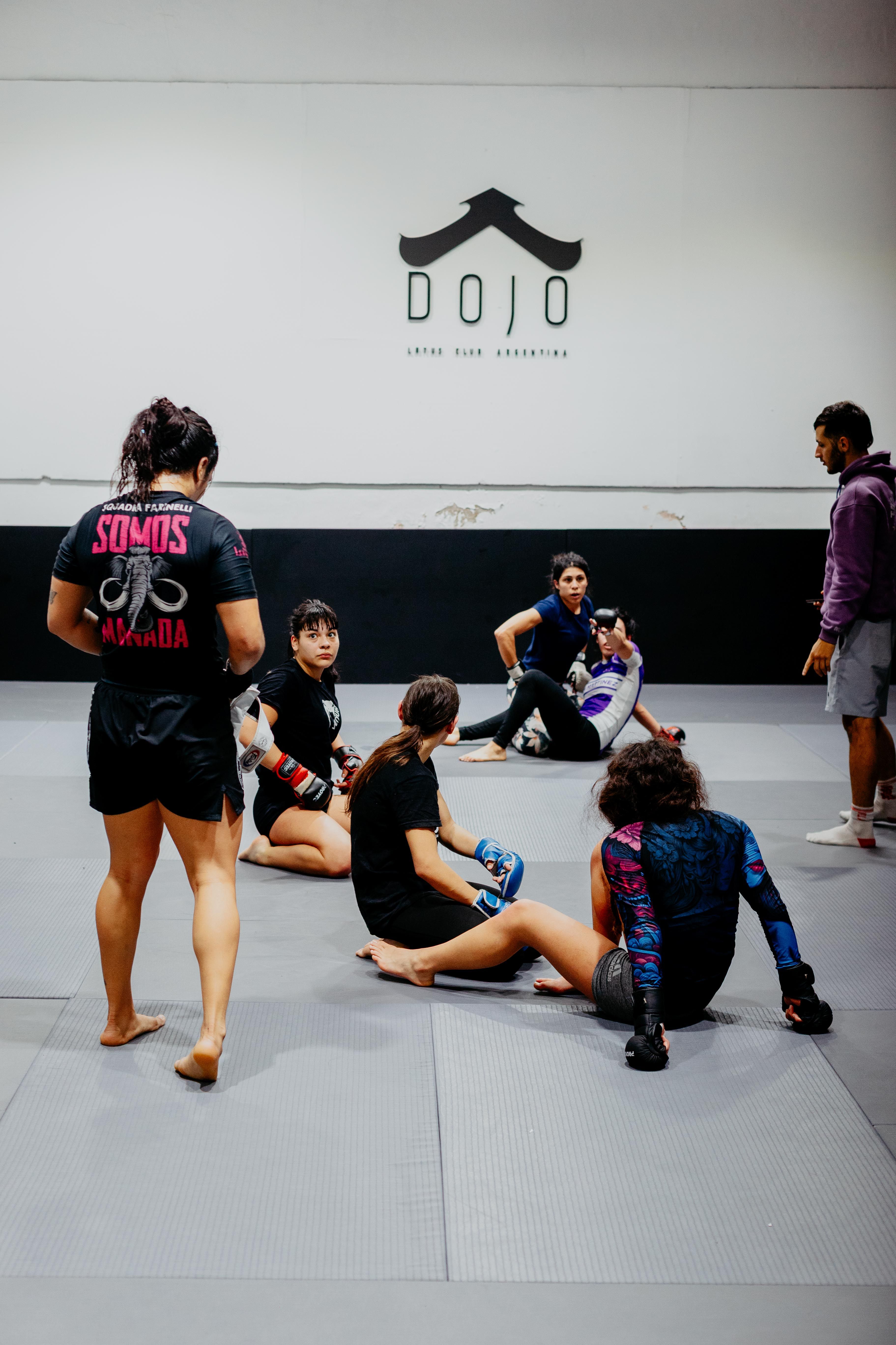 Group of adults training in a martial arts dojo in Buenos Aires, Argentina.