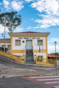 View of Câmara Municipal de Santa Luzia with vibrant colors and clear skies.