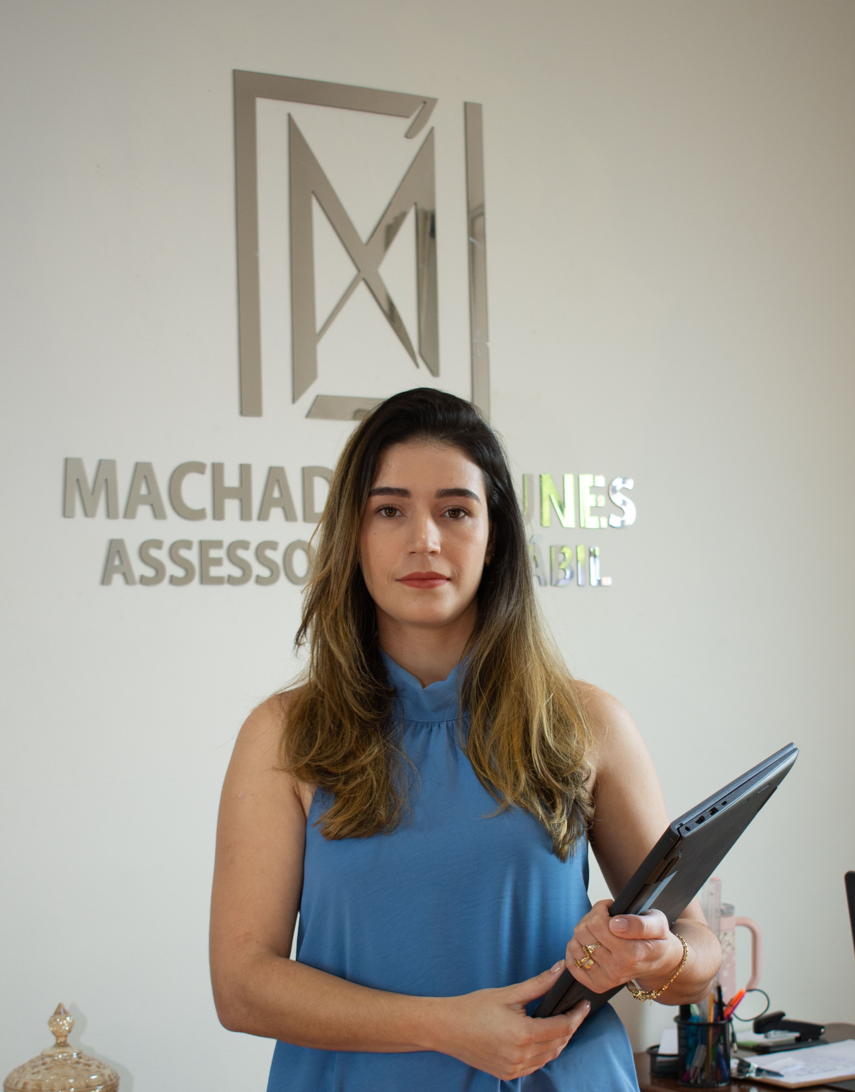 Businesswoman holding a tablet in a modern office setting in Tiros, Brazil.