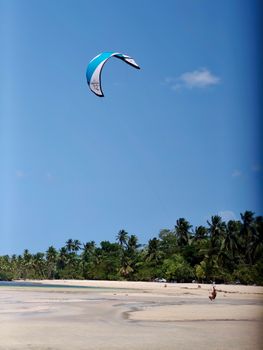 Experience the thrill of kiteboarding on the scenic beaches of Samaná, Dominican Republic.