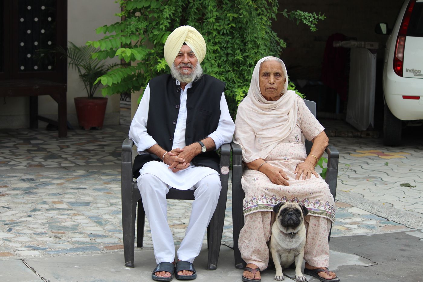 Indian senior couple at home for an elder-care visit Indian senior couple at home for an elder-care visit