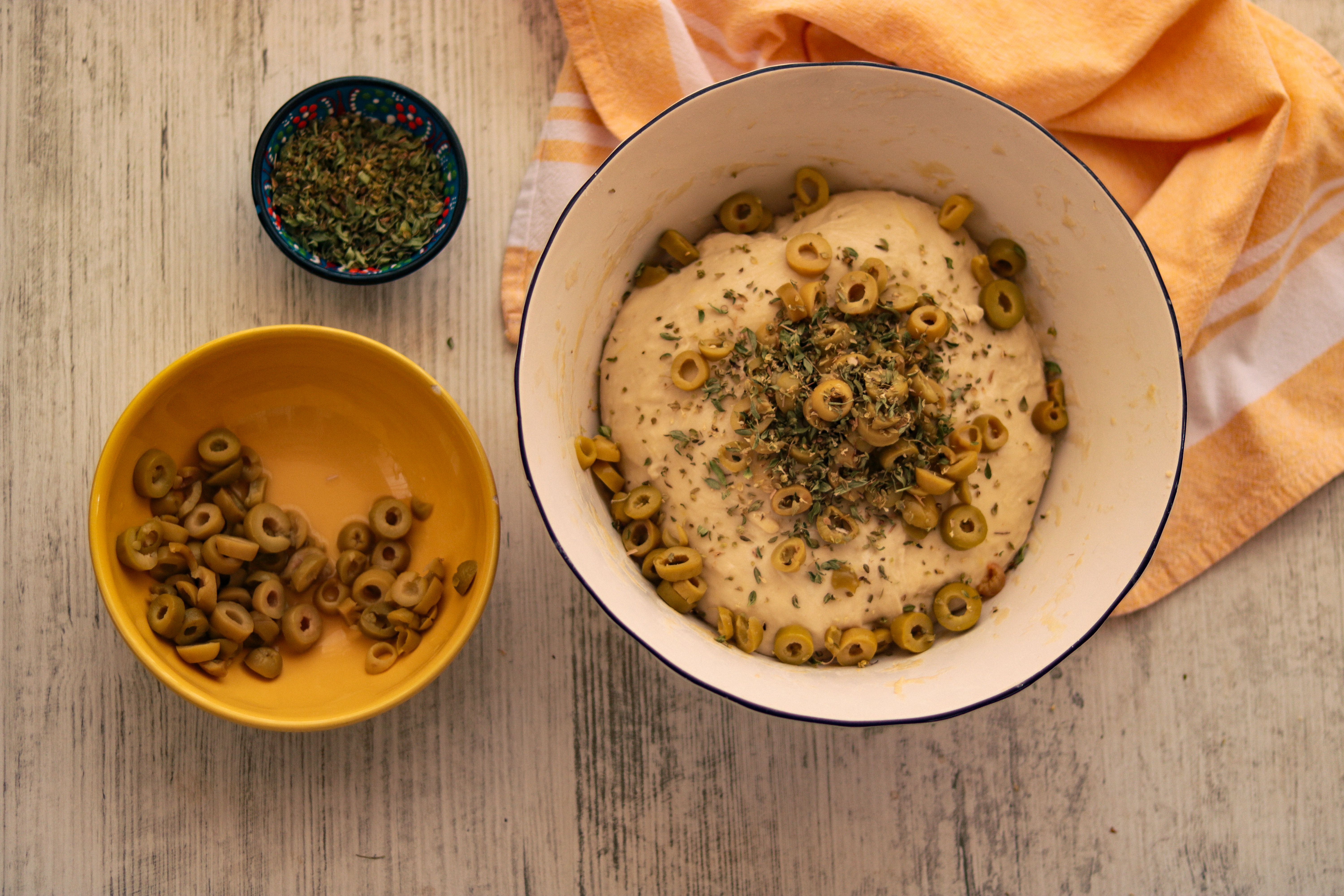 Delicious homemade olive bread dough seasoned with herbs, ready for baking. - Photo by Feyza Daştan on Pexels