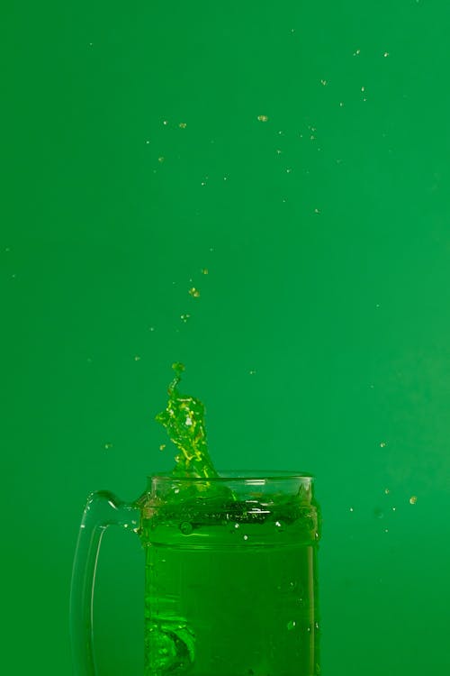 Clear Glass Mug With Green Liquid