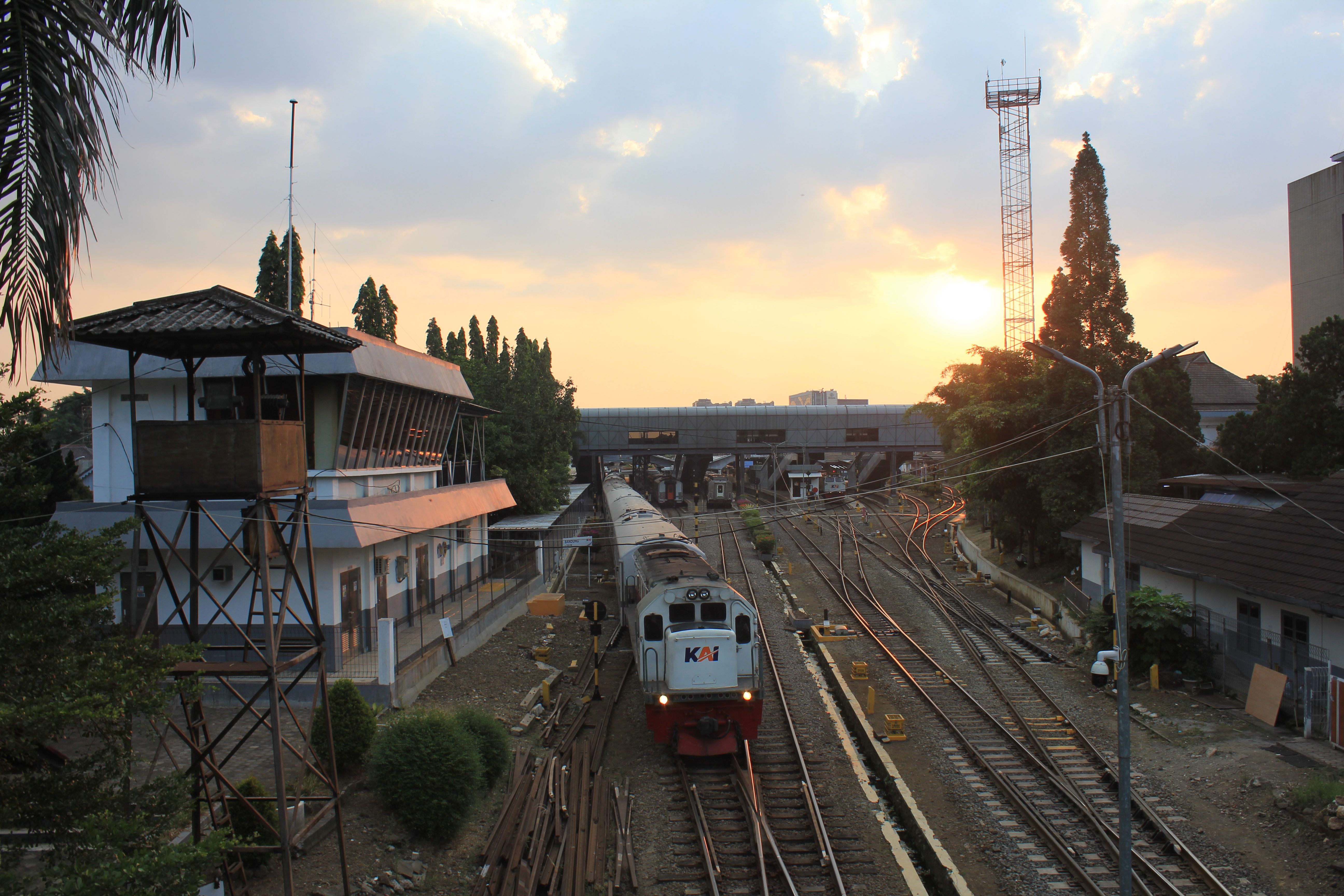 Sunset Train Passing by Station in West Java
