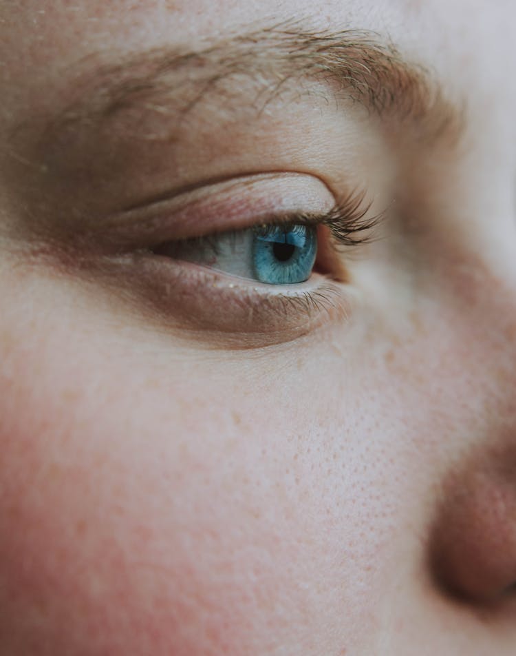 Crop Unrecognizable Dreamy Woman With Blue Eye