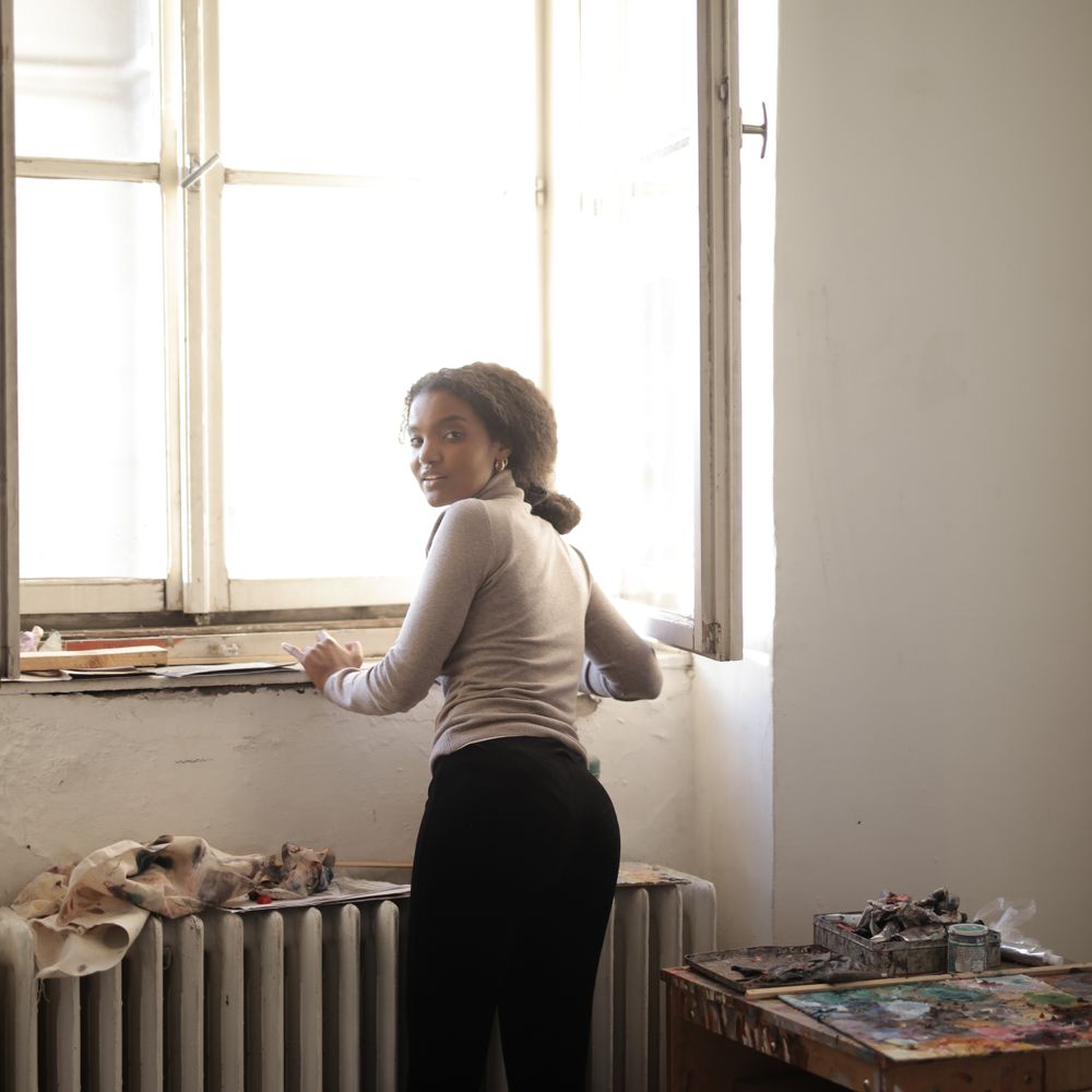House Painting in North Kensington — a decorator at work mid-project