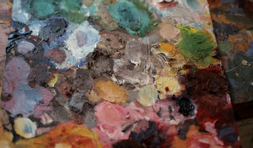 Artists palette with multicolored paints