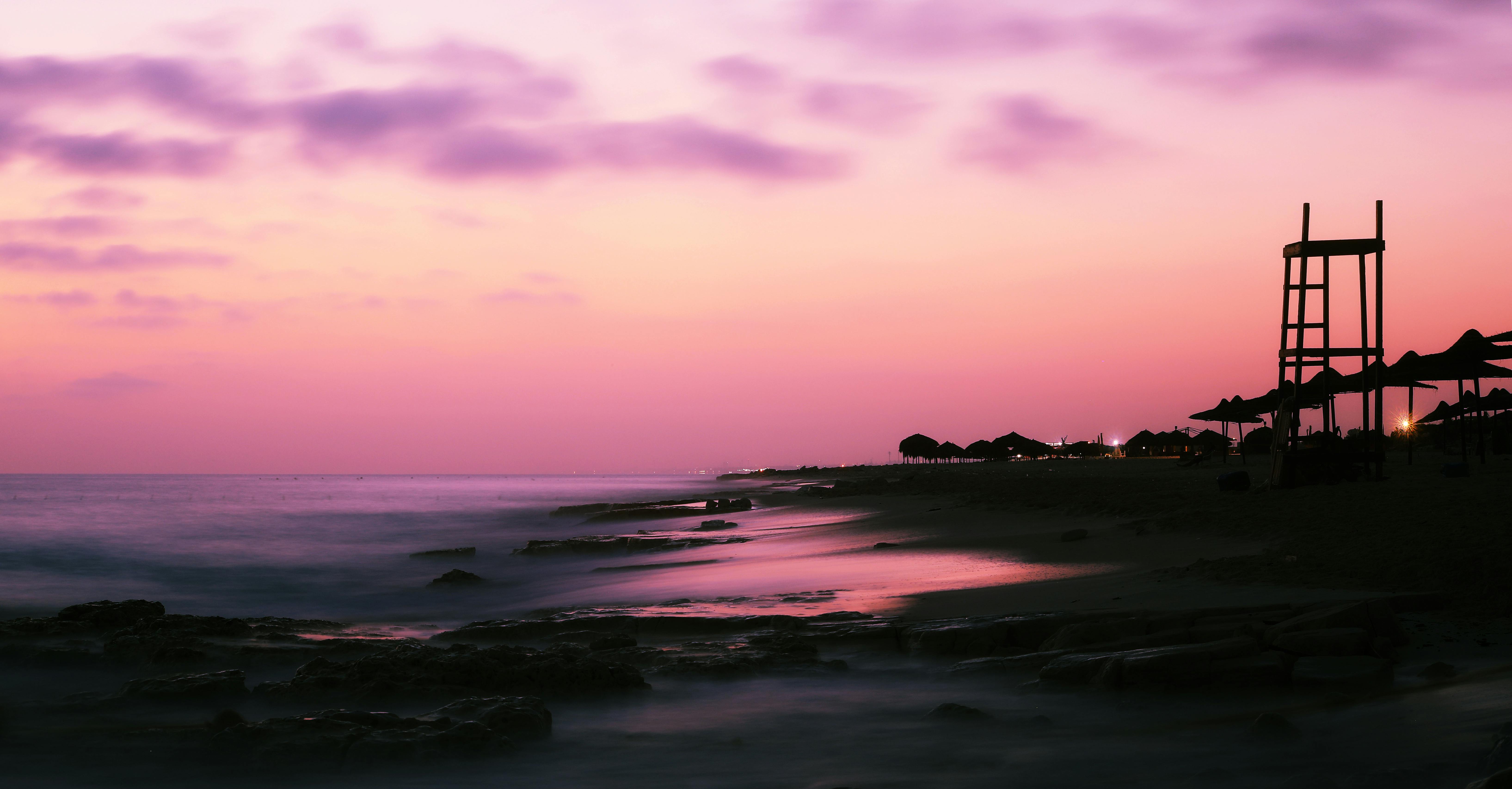 spectacular view of seascape under bright sky at sunset