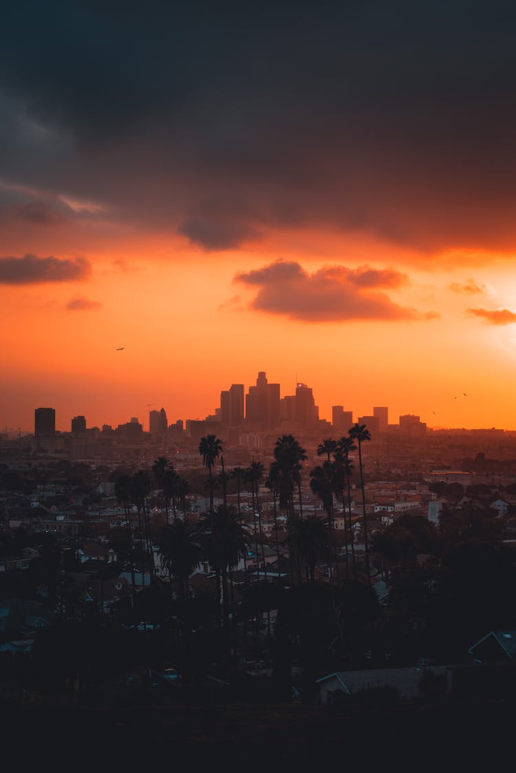 City Skyline Under Orange And Blue Sky