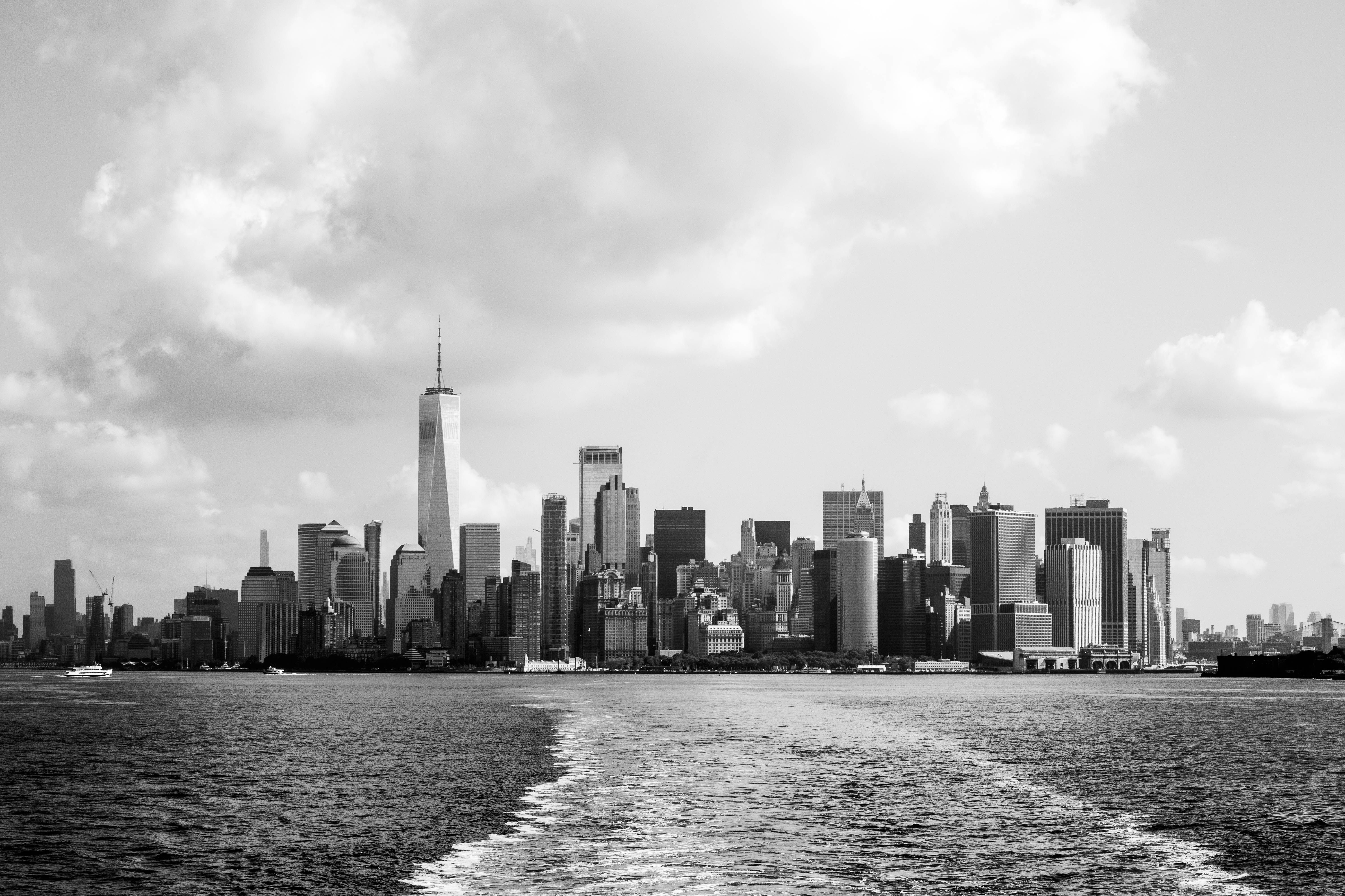 Stunning black and white panoramic view of New York City skyline with prominent One World Trade Center.