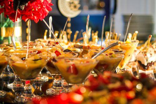 Free Colorful fruit cocktail buffet with elegant glass presentation at an event. Stock Photo