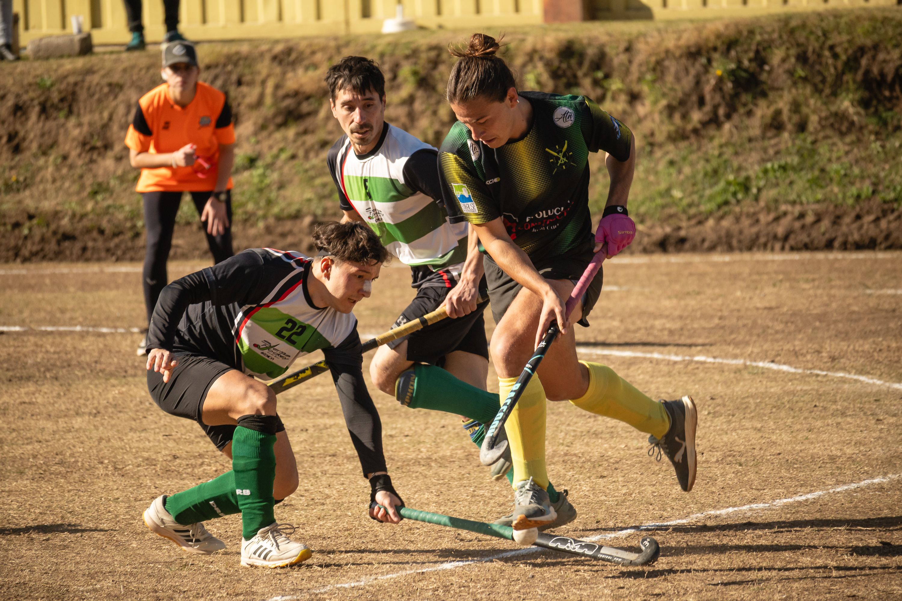 Field hockey players competing in an Ultimate Events & Sports showcase