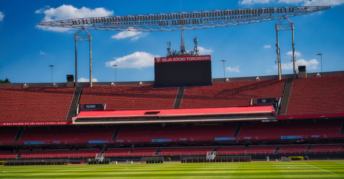 futuristic smart stadium with AI crowd analytics and LED screens