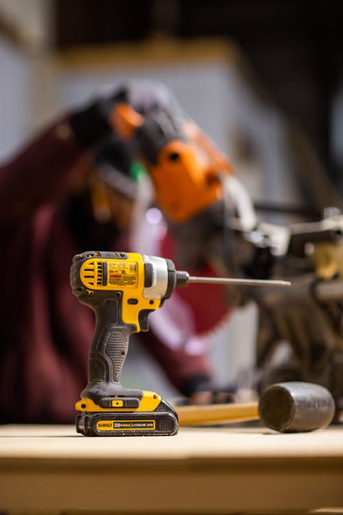 Free Yellow And Black Cordless Hand Drill Stock Photo