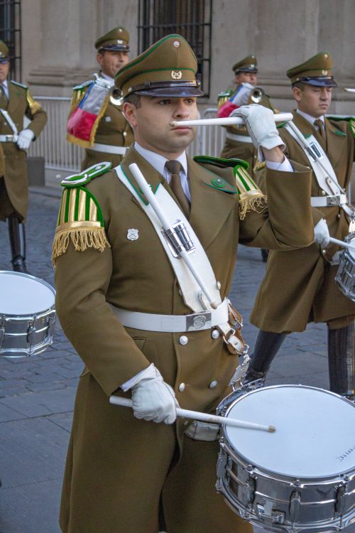 Free Military band members in uniform during a parade in Santiago, Chile, showcasing discipline and heritage. Stock Photo
