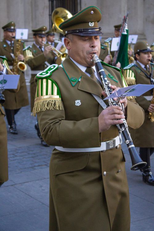 Free A military band performs in uniform during a parade in Santiago, showcasing clarinet players. Stock Photo
