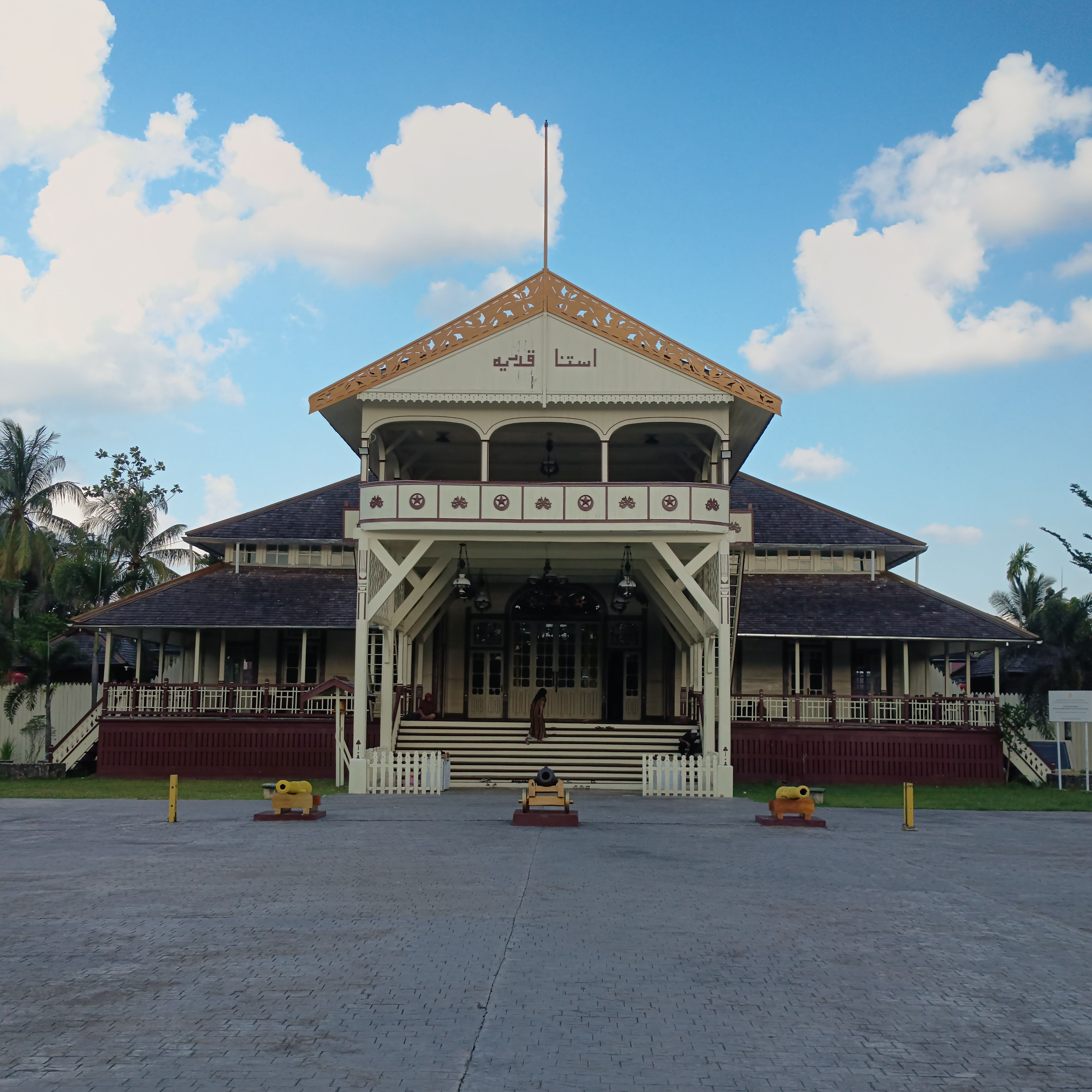 Stunning front view of Kadriah Palace in Pontianak, Indonesia with clear blue sky.
