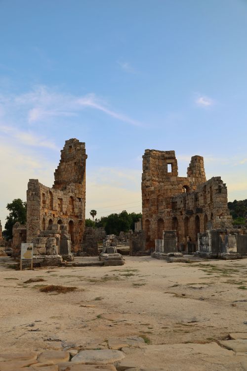 Free Explore the stunning ancient Roman ruins in Antalya, Türkiye, captured during a serene summer sunset. Stock Photo