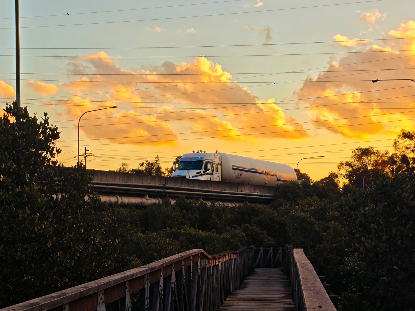 Logistics truck on highway at sunset