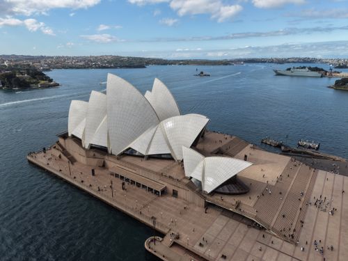 Free Aerial view of the iconic Sydney Opera House surrounded by Sydney Harbour. Stock Photo