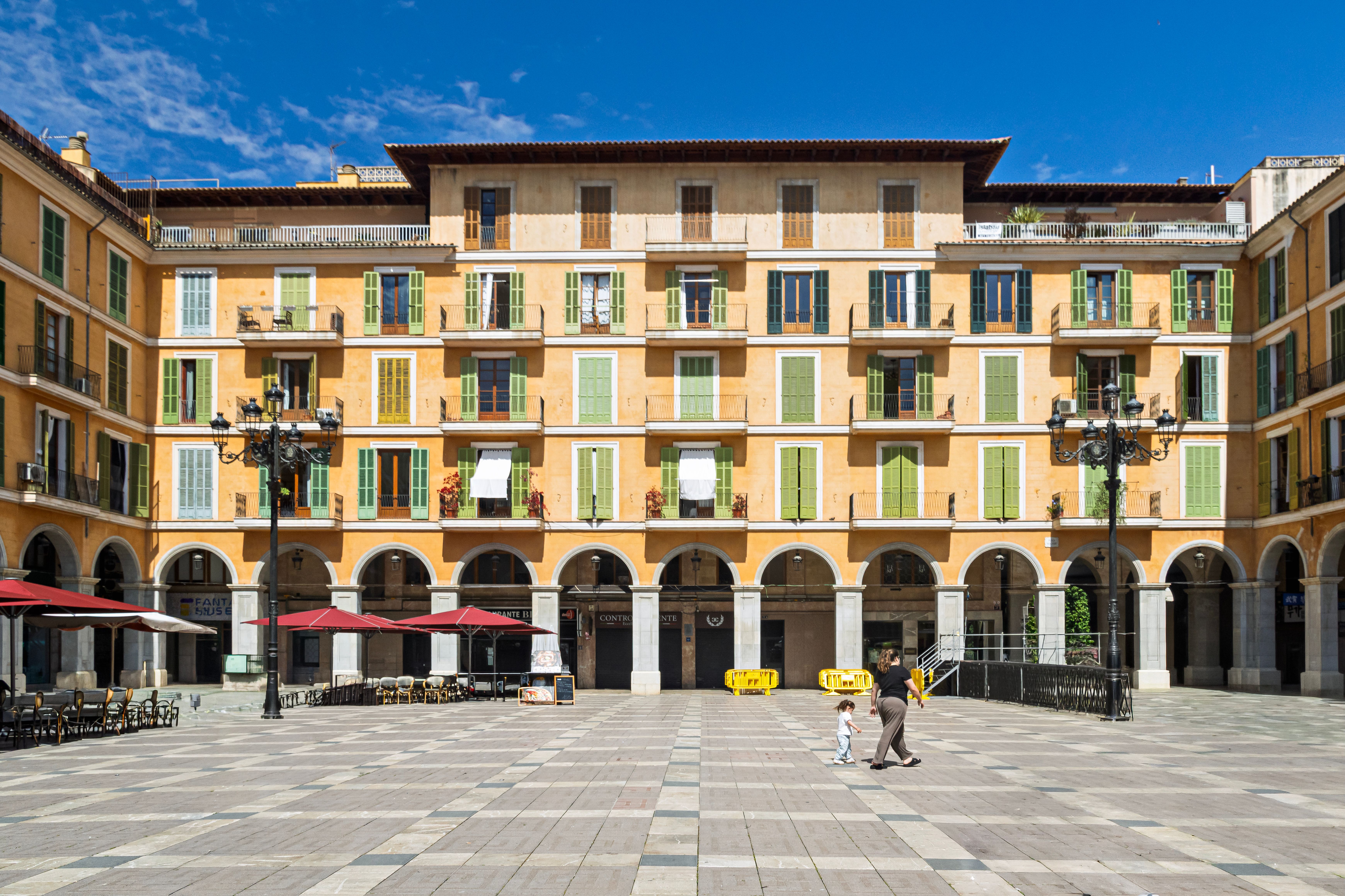 Walk the arcaded Plaza Mayor