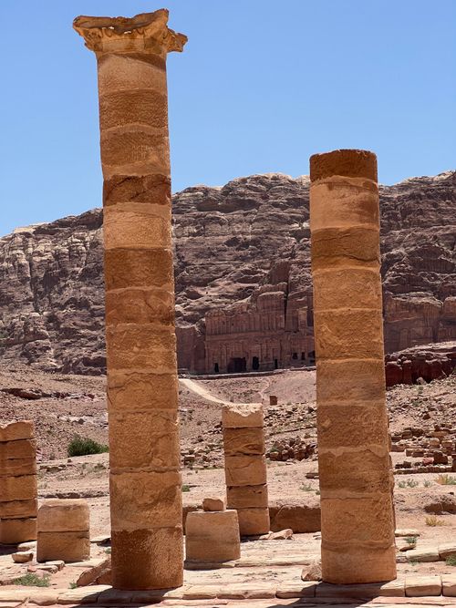 Free Majestic ancient columns in Petra, Jordan, showcasing historic Nabataean architecture under a bright sky. Stock Photo