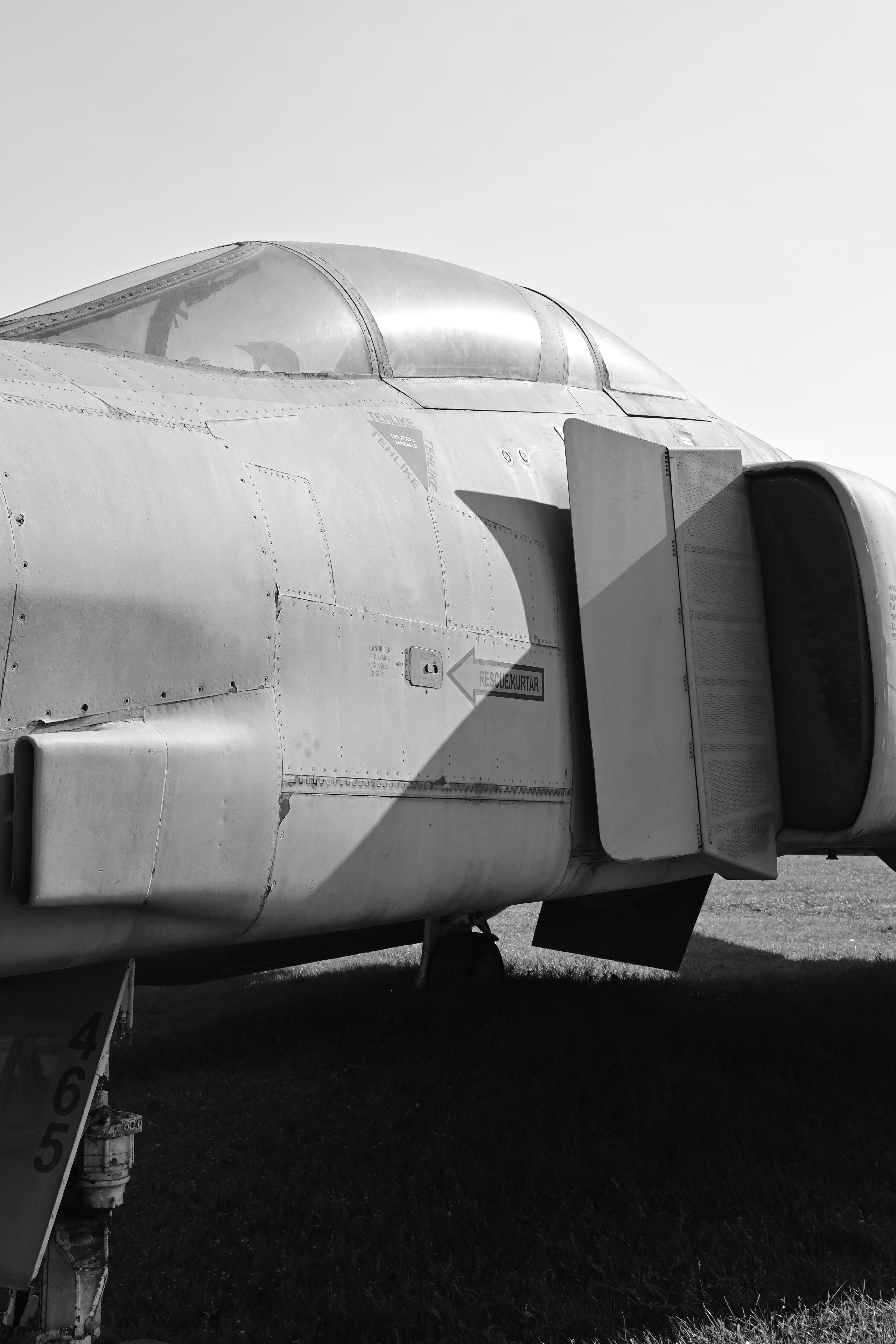 Close-up of a vintage military jet fighter displayed outdoors in Eskişehir, Türkiye.