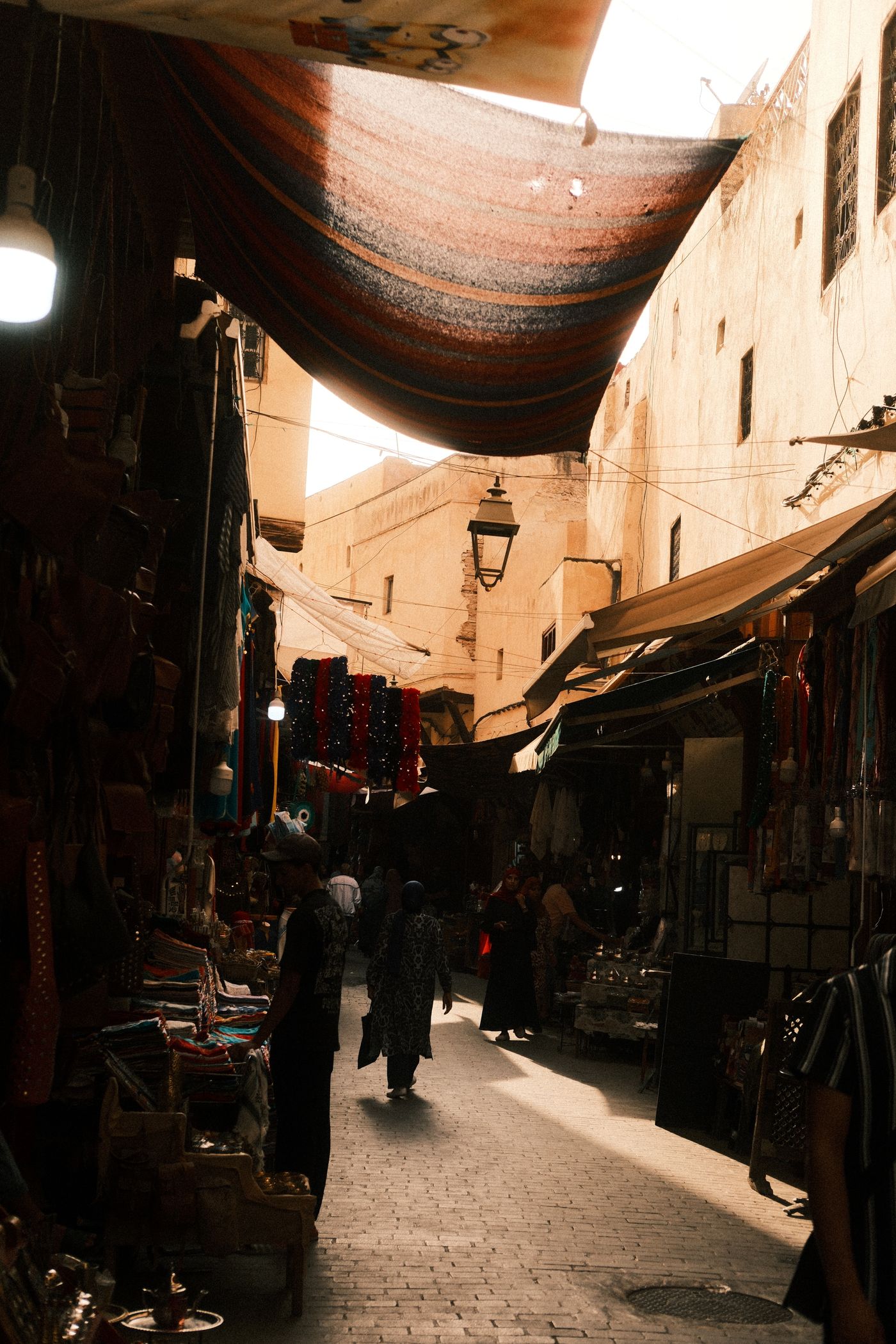 Historic market alley inside Fes medina, Morocco