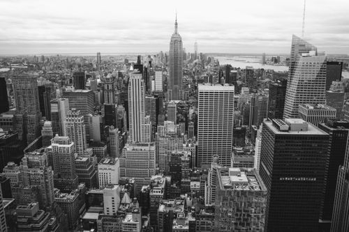 Free Classic black and white view of New York City's skyline featuring skyscrapers and urban architecture. Stock Photo